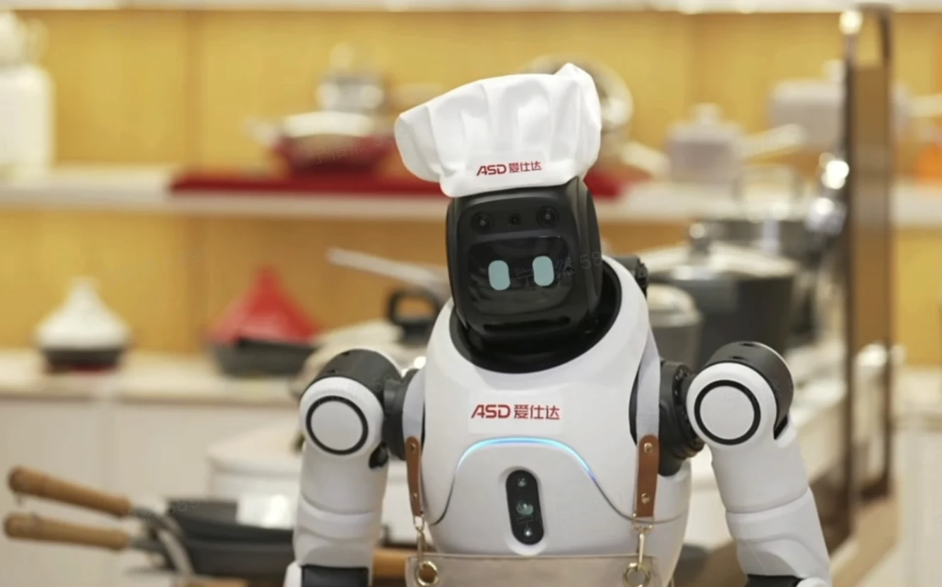 AGIBOT X2 wearing ASD branding and a chef-style hat in a retail setting.