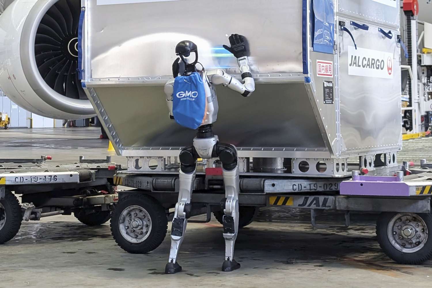 Japan Airlines Haneda airport humanoid robot baggage handling 2026